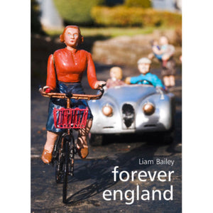 The image shows the cover of the book 'Forever England' by Liam Bailey, featuring a photograph of a figurine of a woman riding a bicycle in front of a model of a vintage car, with other miniature figures and a red brick wall in the background.